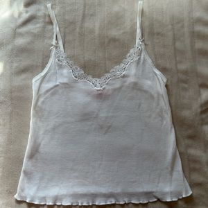 A medium white waffle Victoria secret under shirt